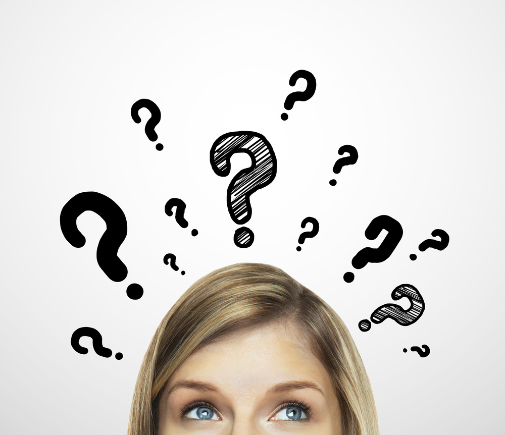 girl with a bunch of questions over her head